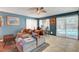 Bright and airy living room with comfortable seating and views of the backyard pool for relaxation and enjoyment at 5019 Lancaster Dr, Las Vegas, NV 89120
