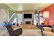 Bright and airy living room with a stone fireplace, modern decor, and ample natural light at 5019 Lancaster Dr, Las Vegas, NV 89120