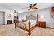 Bright bedroom with decorative bed frame, lamps, and ceiling fan at 5019 Lancaster Dr, Las Vegas, NV 89120