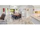 Dining room features tile flooring, built-in cabinets, and backyard views at 5200 Wheatland Dr, Pahrump, NV 89061
