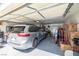 Spacious garage with ample storage, a parked van, and neatly organized moving boxes at 5200 Wheatland Dr, Pahrump, NV 89061