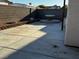 Backyard with patio featuring a concrete fountain, block walls, and brick accents at 529 Rancho Del Mar Way, North Las Vegas, NV 89031