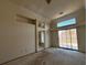 Spacious main bedroom with a sliding glass door, ensuite bathroom, and large window at 529 Rancho Del Mar Way, North Las Vegas, NV 89031