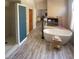 Modern bathroom featuring a soaking tub, shower, and fireplace at 5381 Waving Sage Dr, Las Vegas, NV 89149