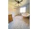 Bedroom featuring carpet flooring, a window with a cushioned seat and a ceiling fan at 5381 Waving Sage Dr, Las Vegas, NV 89149