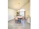 Cozy dining room with a chandelier, stylish chairs, and plenty of natural light at 5381 Waving Sage Dr, Las Vegas, NV 89149