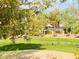 Lush greenspace on golf course with trees, geese, and home in background at 5381 Waving Sage Dr, Las Vegas, NV 89149