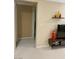 A bedroom features shelves on the wall and an adjacent walkway with paneling offering style and functionality at 5627 Spanish Valor Rd, Las Vegas, NV 89135