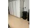 Functional garage featuring white storage cabinets, optimizing space and organization for convenience and utility at 5627 Spanish Valor Rd, Las Vegas, NV 89135