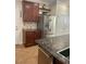 Stylish kitchen with stainless steel appliances, granite counters, and shaker cabinets at 5627 Spanish Valor Rd, Las Vegas, NV 89135