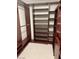 Spacious walk-in closet featuring custom shelves and ample storage, perfect for organizing your wardrobe at 5627 Spanish Valor Rd, Las Vegas, NV 89135
