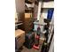 A filled closet with organizers and everyday tools at 5710 E Tropicana Ave # 1053, Las Vegas, NV 89122