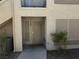 Inviting front entrance to this unit featuring a screen door, secure access, and easy access to the community at 5710 E Tropicana Ave # 1053, Las Vegas, NV 89122