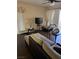 Large living room with lots of seating and a balcony that lets in great natural light at 5710 E Tropicana Ave # 1053, Las Vegas, NV 89122