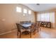Bright dining room featuring natural light and a large table for Gathering gatherings at 6274 Elderberry Wine Ave, Las Vegas, NV 89142