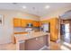 Well-equipped kitchen featuring an island, stainless steel appliances, and ample cabinet space at 6274 Elderberry Wine Ave, Las Vegas, NV 89142