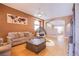 Open living space with wood floors, comfortable seating, and stylish decor at 6274 Elderberry Wine Ave, Las Vegas, NV 89142