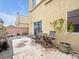 Cozy backyard patio with quaint seating area, perfect for relaxing outdoors at 6324 Desert Leaf St # 3, North Las Vegas, NV 89081