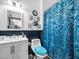 Cozy bathroom with blue accents at 6324 Desert Leaf St # 3, North Las Vegas, NV 89081
