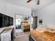 Bedroom features a sliding mirror closet and a television at 6324 Desert Leaf St # 3, North Las Vegas, NV 89081