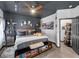 Stylish bedroom with decor and dark colored ceilings at 6324 Desert Leaf St # 3, North Las Vegas, NV 89081
