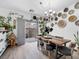 Dining room features stylish decor and a sliding door to the outside at 6324 Desert Leaf St # 3, North Las Vegas, NV 89081