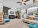 Bright living room with modern decor, hardwood floors and lots of natural light at 6324 Desert Leaf St # 3, North Las Vegas, NV 89081