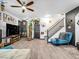 Cozy living room featuring open floor plan, hardwood floors and stylish decor at 6324 Desert Leaf St # 3, North Las Vegas, NV 89081