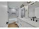 Well-appointed bathroom with dual sinks, modern fixtures, and a tub at 6664 Rutgers Dr, Las Vegas, NV 89156