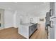 Modern kitchen boasts an expansive island, stainless steel appliances, and sleek countertops, ideal for cooking and entertaining at 6664 Rutgers Dr, Las Vegas, NV 89156