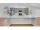 A contemporary kitchen with stainless steel appliances, an island, and ample cabinet space, blending style and functionality at 6664 Rutgers Dr, Las Vegas, NV 89156