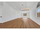 Spacious living area features modern lighting and luxury vinyl plank flooring at 6664 Rutgers Dr, Las Vegas, NV 89156