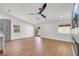 Open concept living area featuring contemporary fan and vinyl plank flooring at 6664 Rutgers Dr, Las Vegas, NV 89156