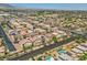 Neighborhood aerial view of homes with solar panels and street landscape at 6750 Quapaw St, Las Vegas, NV 89149