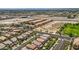 View of neighborhood homes, street landscape, and schools nearby at 6750 Quapaw St, Las Vegas, NV 89149