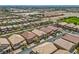 An aerial view of the neighborhood, displaying many homes and neighborhood landscape at 6750 Quapaw St, Las Vegas, NV 89149