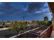 Balcony view showcasing a peaceful residential street and neighborhood landscape at 6750 Quapaw St, Las Vegas, NV 89149