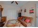 Bedroom with a futon and a TV at 6750 Quapaw St, Las Vegas, NV 89149
