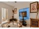 Bedroom with a futon and a TV at 6750 Quapaw St, Las Vegas, NV 89149
