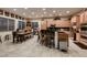 Spacious kitchen featuring an eat-in area, stainless steel appliances, and tile flooring at 6750 Quapaw St, Las Vegas, NV 89149