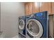 Efficient laundry room with modern washer and dryer at 6750 Quapaw St, Las Vegas, NV 89149