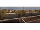 Picture from backyard, showcasing the homes across the street at 6750 Quapaw St, Las Vegas, NV 89149