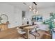 Dining area with modern light fixture and decor, bright space at 679 Riverband Pl, Henderson, NV 89052