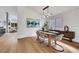 Chic dining area with modern light fixture and stylish decor at 679 Riverband Pl, Henderson, NV 89052