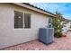 Exterior of the home showing the air conditioning unit at 679 Riverband Pl, Henderson, NV 89052