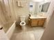 Functional bathroom features a tiled shower/tub combination, neutral wall color and a functional vanity at 698 S Racetrack Rd # 322, Henderson, NV 89015