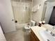 Bright bathroom features a tiled shower/tub combination, a vanity, and a toilet at 698 S Racetrack Rd # 322, Henderson, NV 89015