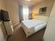 Inviting bedroom with large bed and private balcony at 698 S Racetrack Rd # 322, Henderson, NV 89015