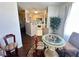 Breakfast nook with unique table set near the kitchen at 698 S Racetrack Rd # 322, Henderson, NV 89015