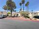 Beautiful exterior showcasing well-maintained buildings, mature trees, and manicured landscaping at 698 S Racetrack Rd # 322, Henderson, NV 89015